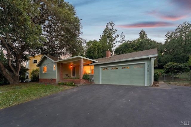 1400 High School Rd, Sebastopol, CA 95472 - view of front of property featuring a chimney, a detached garage, a porch, and a front lawn