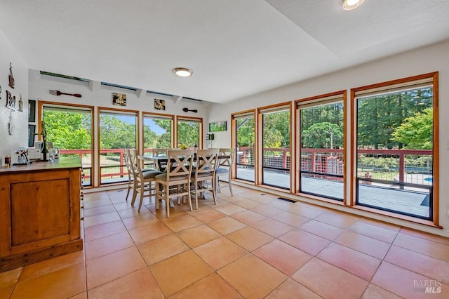 7293 Occidental Rd, Sebastopol, CA 95472 - dining area with light tile patterned flooring and recessed lighting