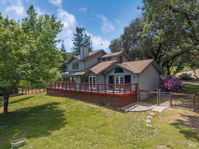7293 Occidental Rd, Sebastopol, CA 95472 - rear view of house with a gate, a deck, a chimney, and french doors