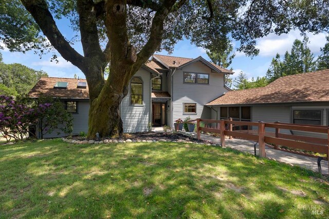 7293 Occidental Rd, Sebastopol, CA 95472 - view of front of house with a front yard and a sunroom