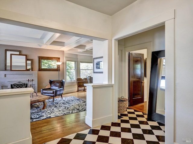 1011 Georgia St, Vallejo, CA 94590 - hallway featuring beamed ceiling, coffered ceiling, tile patterned floors, and baseboards