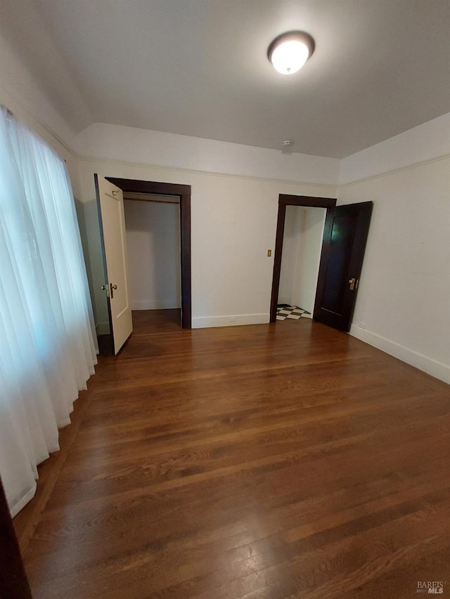 1011 Georgia St, Vallejo, CA 94590 - empty room with dark wood-style flooring and baseboards