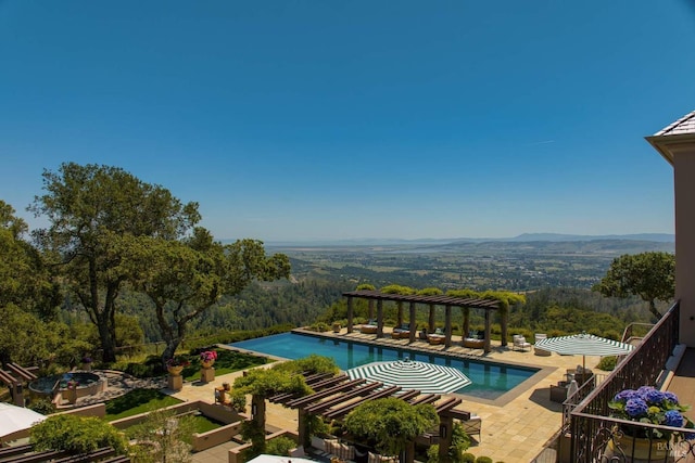 17256 7th St E, Sonoma, CA 95476 - view of swimming pool with an infinity pool, a pergola, a patio, and a view of trees