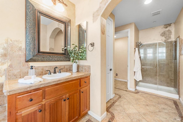 201 Red Pheasant Dr, Vacaville, CA 95687 - full bath featuring a stall shower, vanity, baseboards, and inlaid floor details