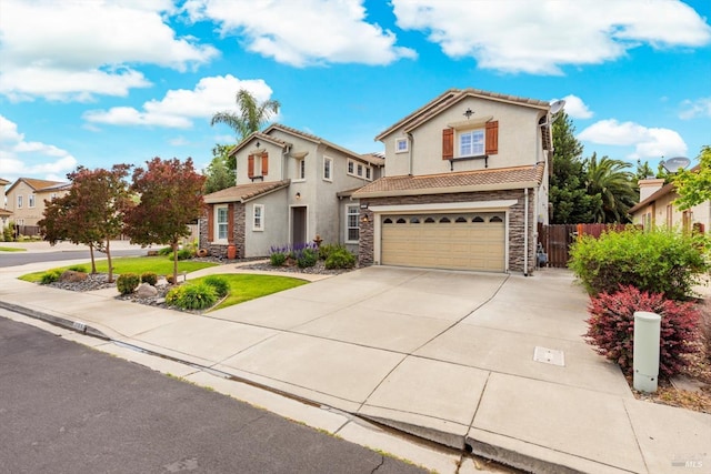 201 Red Pheasant Dr, Vacaville, CA 95687 - traditional-style house with stone siding, a garage, driveway, stucco siding, and a tile roof