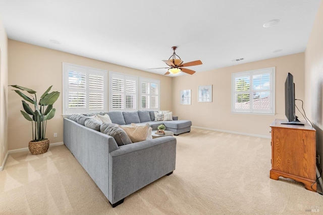 201 Red Pheasant Dr, Vacaville, CA 95687 - living area with light colored carpet, baseboards, and a ceiling fan