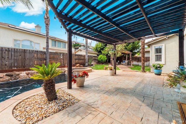 201 Red Pheasant Dr, Vacaville, CA 95687 - view of patio / terrace with a pergola, a fenced backyard, and a jacuzzi