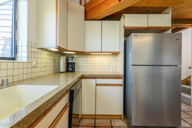 41923 Mizzen Mast, The Sea Ranch, CA 95497 - kitchen featuring stainless steel appliances, decorative backsplash, white cabinets, and light countertops