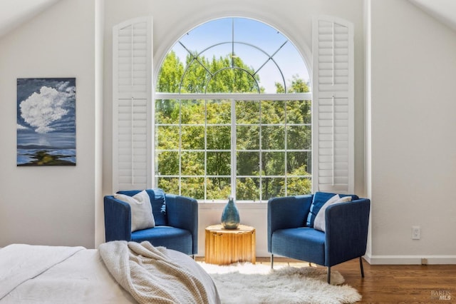 9724 Green Valley Rd, Sebastopol, CA 95472 - bedroom featuring multiple windows, wood finished floors, baseboards, and vaulted ceiling