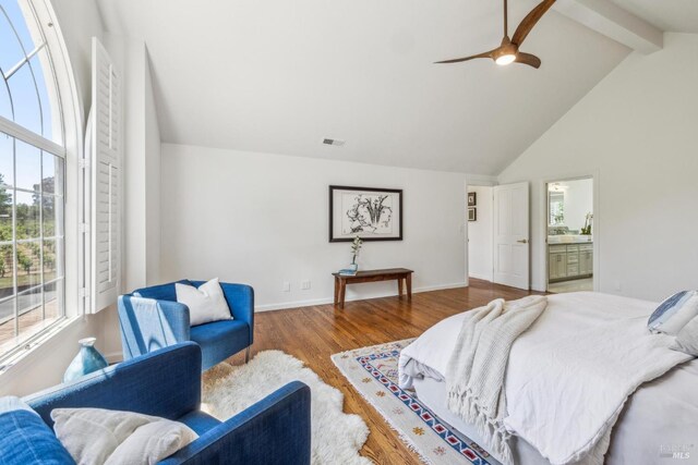9724 Green Valley Rd, Sebastopol, CA 95472 - bedroom featuring multiple windows, wood finished floors, high vaulted ceiling, beamed ceiling, and baseboards