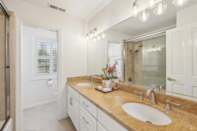 9724 Green Valley Rd, Sebastopol, CA 95472 - bathroom with tile patterned flooring, toilet, tiled shower, baseboards, and double vanity