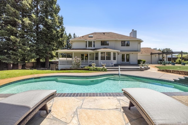 9724 Green Valley Rd, Sebastopol, CA 95472 - rear view of house featuring a pergola, an outdoor pool, a patio, and a chimney