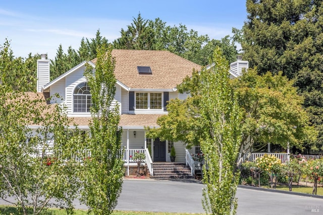 9724 Green Valley Rd, Sebastopol, CA 95472 - view of front of home with a porch, roof with shingles, and a chimney