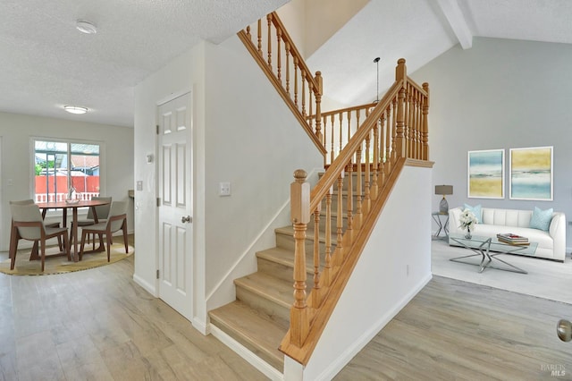 181 Belvedere Ct, Vallejo, CA 94589 - stairway with wood finished floors, a textured ceiling, and baseboards