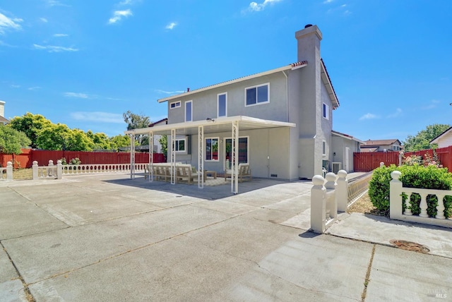 181 Belvedere Ct, Vallejo, CA 94589 - back of property with a porch, a chimney, and stucco siding