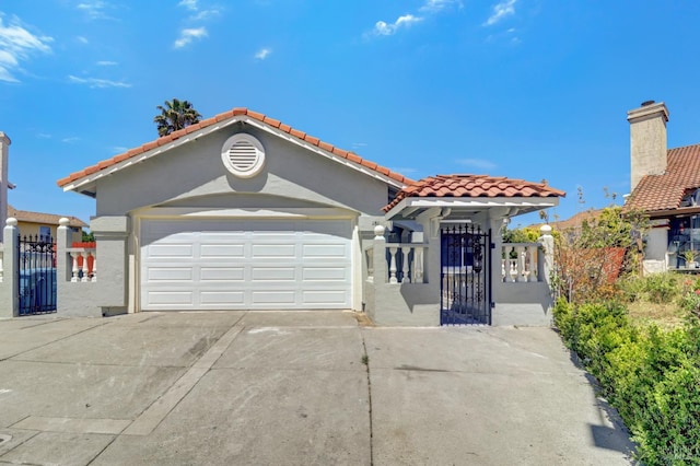 181 Belvedere Ct, Vallejo, CA 94589 - mediterranean / spanish-style house featuring a gate, stucco siding, concrete driveway, and a fenced front yard