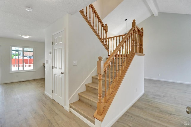 181 Belvedere Ct, Vallejo, CA 94589 - staircase with wood finished floors, a textured ceiling, and baseboards