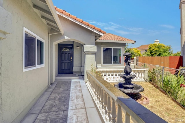 181 Belvedere Ct, Vallejo, CA 94589 - view of exterior entry featuring stucco siding and a tile roof