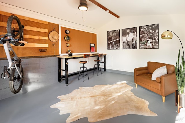 office space featuring a workshop area and finished concrete floors