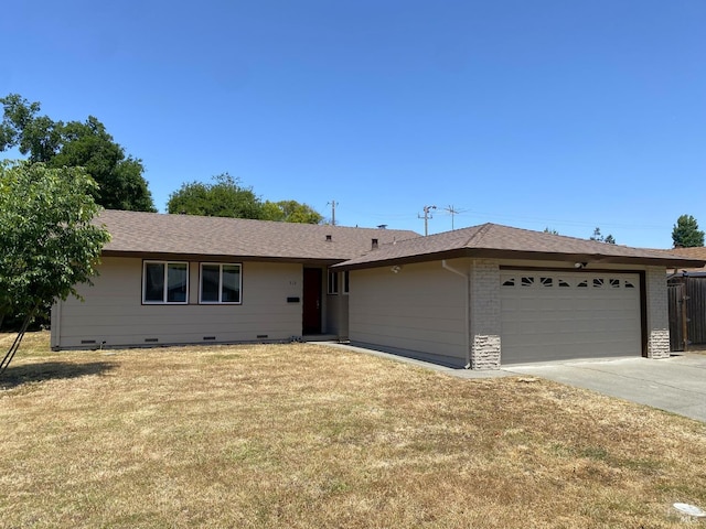 312 Dahlia St, Fairfield, CA 94533 - ranch-style home with a garage, concrete driveway, a front yard, and a shingled roof