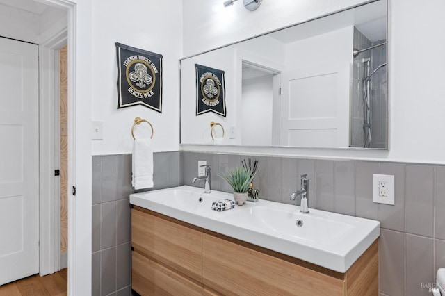4512 Dry Creek Rd, Napa, CA 94558 - full bath featuring tile walls, a wainscoted wall, and double vanity