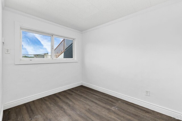 4335 Bodega Ave, Petaluma, CA 95942 - unfurnished room featuring ornamental molding, dark wood-style flooring, and baseboards
