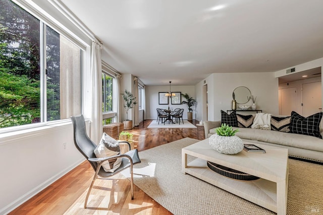600 Deer Valley Rd Unit 1E, San Rafael, CA 94903 - living room featuring wood finished floors and baseboards