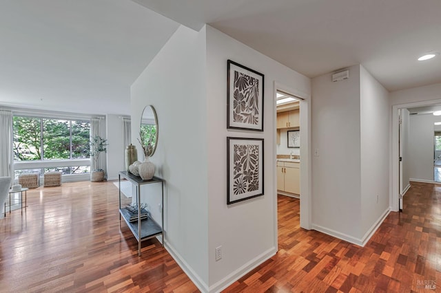 600 Deer Valley Rd Unit 1E, San Rafael, CA 94903 - corridor featuring wood finished floors, baseboards, and recessed lighting