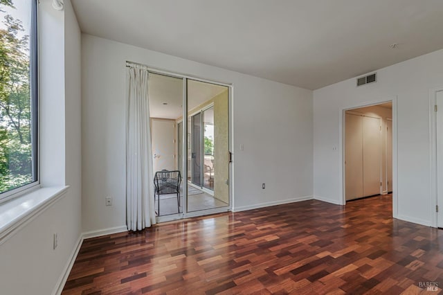 600 Deer Valley Rd Unit 1E, San Rafael, CA 94903 - unfurnished room with wood finished floors and baseboards