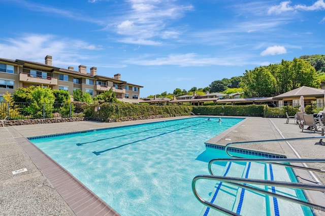 600 Deer Valley Rd Unit 1E, San Rafael, CA 94903 - community pool with fence and a patio area