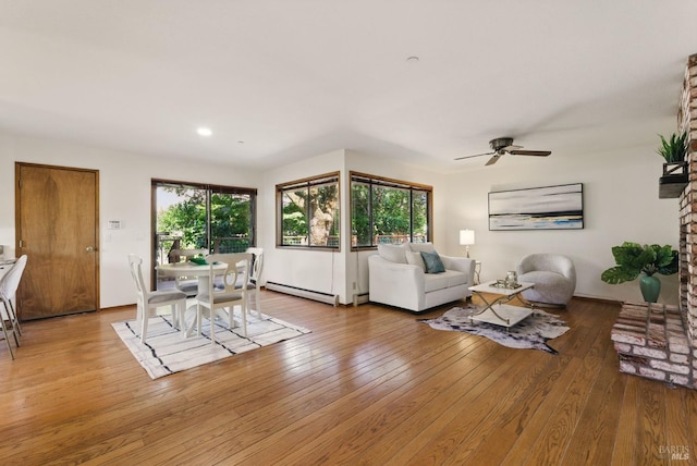 4620 Morris Ct, Santa Rosa, CA 95405 - living area featuring a baseboard heating unit, wood-type flooring, and a ceiling fan