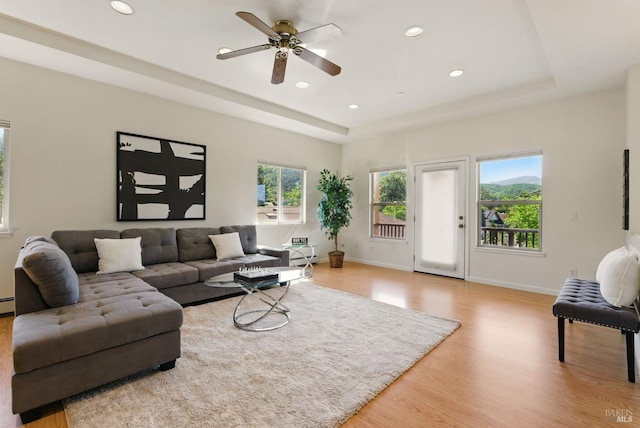 4620 Morris Ct, Santa Rosa, CA 95405 - living room with light wood-type flooring, recessed lighting, a raised ceiling, ceiling fan, and baseboards