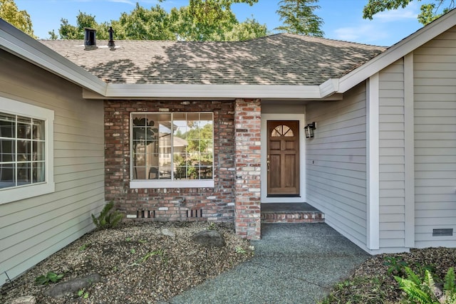 430 Woodley Pl, Santa Rosa, CA 95409 - doorway to property with roof with shingles and brick siding