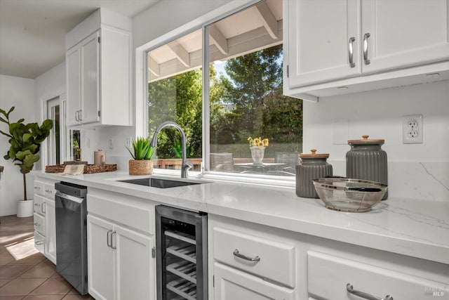 430 Woodley Pl, Santa Rosa, CA 95409 - kitchen with beverage cooler, a sink, and white cabinetry