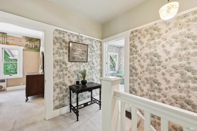 4100 Petrified Forest Rd, Santa Rosa, CA 94515 - hallway with radiator heating unit, carpet, and an upstairs landing