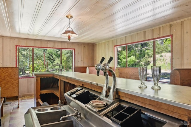 4100 Petrified Forest Rd, Santa Rosa, CA 94515 - kitchen with healthy amount of natural light, wooden walls, decorative light fixtures, and light countertops