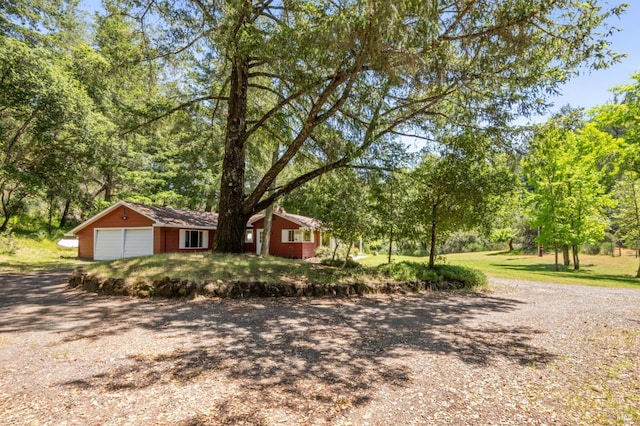 4100 Petrified Forest Rd, Santa Rosa, CA 94515 - view of home's exterior with a garage and driveway