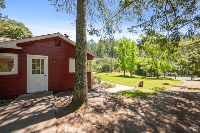 4100 Petrified Forest Rd, Santa Rosa, CA 94515 - view of side of home with a lawn
