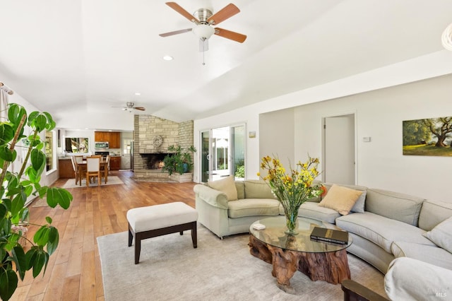 4100 Petrified Forest Rd, Santa Rosa, CA 94515 - living room featuring ceiling fan, light wood-style flooring, vaulted ceiling, and a fireplace