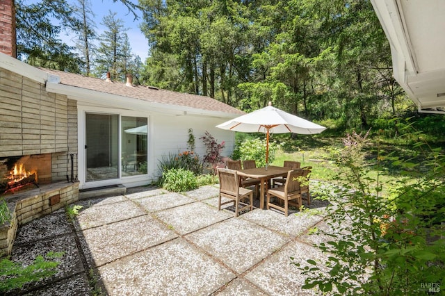 4100 Petrified Forest Rd, Santa Rosa, CA 94515 - view of patio / terrace featuring an outdoor brick fireplace and outdoor dining area