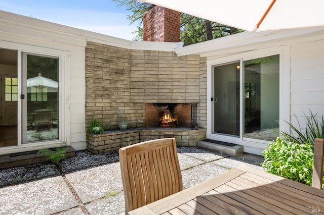 4100 Petrified Forest Rd, Santa Rosa, CA 94515 - view of patio featuring an outdoor brick fireplace