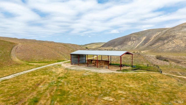 8050 Bitterwater Rd, Shandon, CA 93461 - view of yard featuring a mountain view, an outdoor structure, and a view of countryside