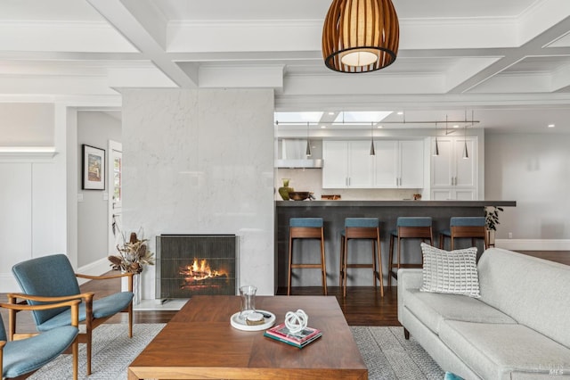 475 Molino Ave, Mill Valley, CA 94941 - living room featuring coffered ceiling, wood finished floors, beam ceiling, a high end fireplace, and baseboards