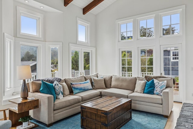 475 Molino Ave, Mill Valley, CA 94941 - living area featuring high vaulted ceiling, beam ceiling, wood finished floors, french doors, and recessed lighting