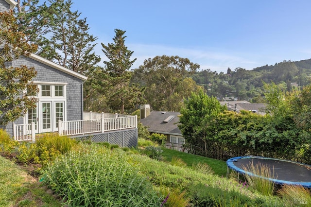 475 Molino Ave, Mill Valley, CA 94941 - view of yard with a trampoline and a wooden deck