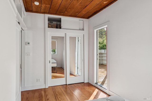 475 Molino Ave, Mill Valley, CA 94941 - doorway featuring wooden ceiling and hardwood / wood-style floors