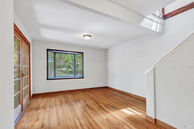 845 W K St, Benicia, CA 94510 - unfurnished room featuring plenty of natural light, wood-type flooring, and baseboards