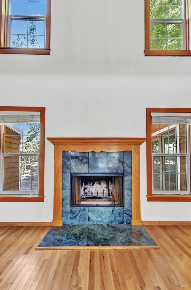 845 W K St, Benicia, CA 94510 - detailed view of wood finished floors, a fireplace, and baseboards