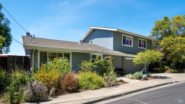 9 Endeavor Cv, Corte Madera, CA 94925 - traditional home with a garage, concrete driveway, and a chimney