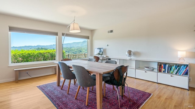 9 Endeavor Cv, Corte Madera, CA 94925 - dining space featuring wood finished floors, baseboards, and a mountain view